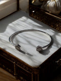 Bracelet jonc femme Cluse finition argentée extrémités hexagonales