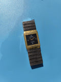 Montre ancienne publicitaire RRDO Jubilé rectangulaire à bracelet métal, à resta