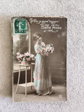 Carte postale Bonne Année CPA femme fleurs DIX 108 début XXe illustrée