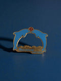 Pin's vintage Marineland Antibes dauphins badge ancien thème marin rare