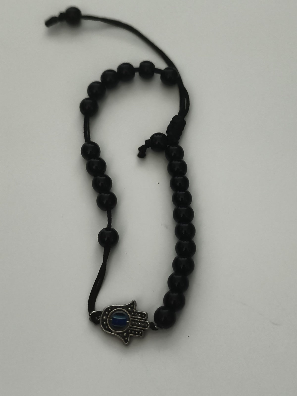 Bracelet vintage perles noires main Hamsa pendentif œil bleu bijou rétro