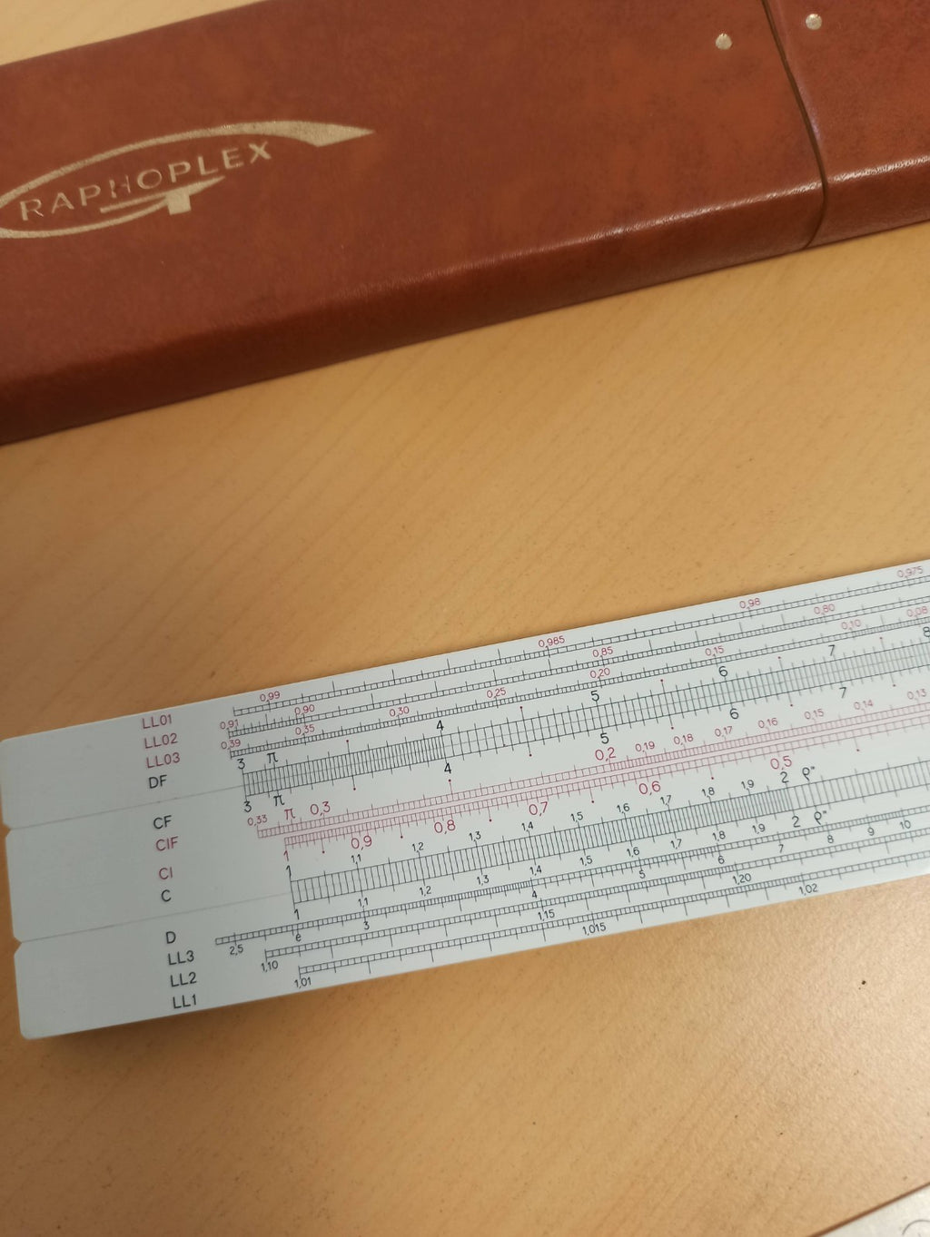 Règle à calcul Raphoplex ancienne avec étui cuir, règle de calcul vintage rétro