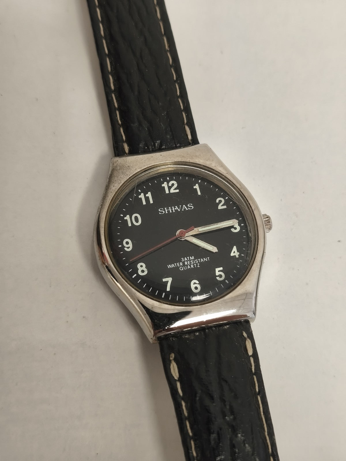 Montre vintage SHIWAS quartz cadran noir étanche 3ATM bracelet noir non testée
