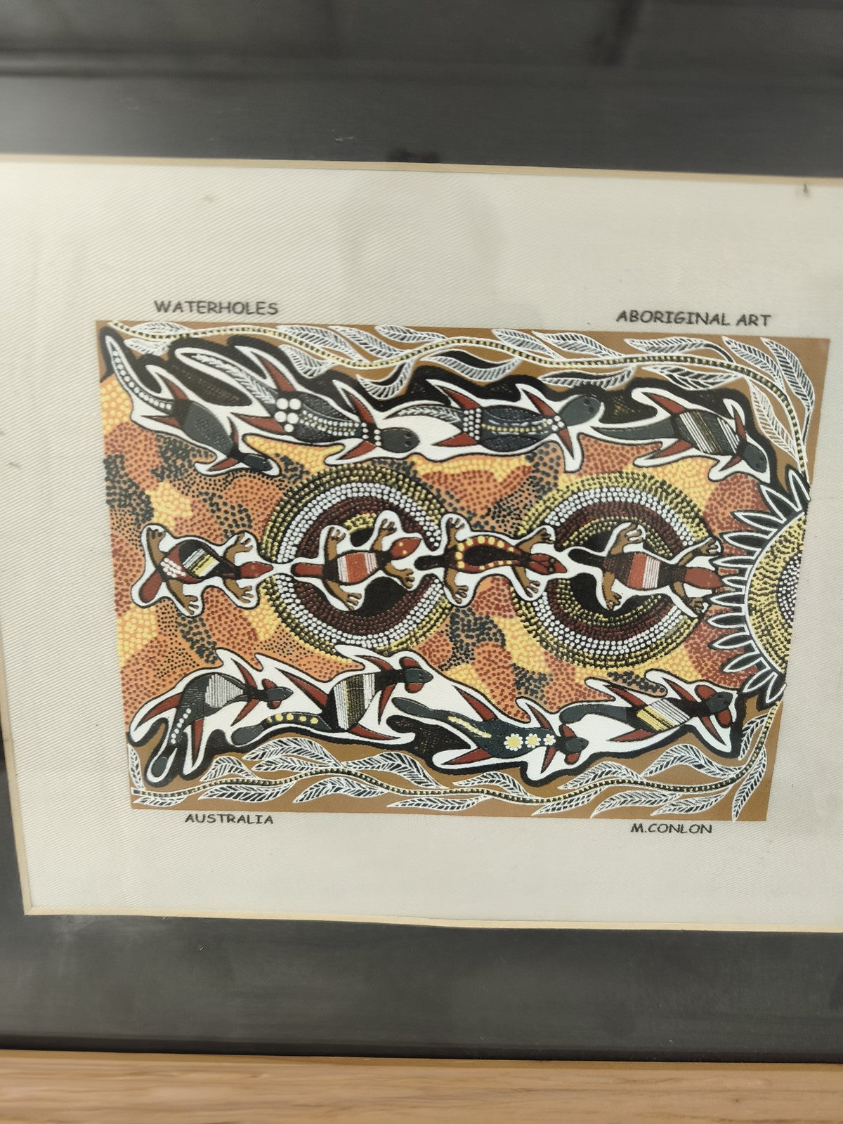 Ancien cadre art aborigène australien, encadrement bois clair, style ethnique