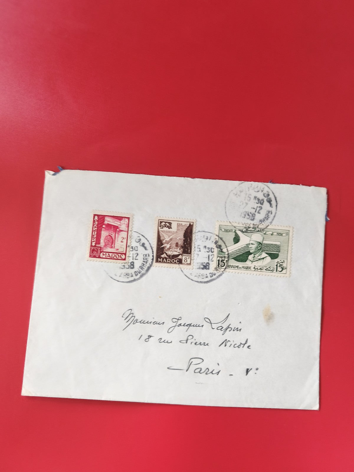 Enveloppe affranchie timbres Maroc, cachets visibles, adressée Paris