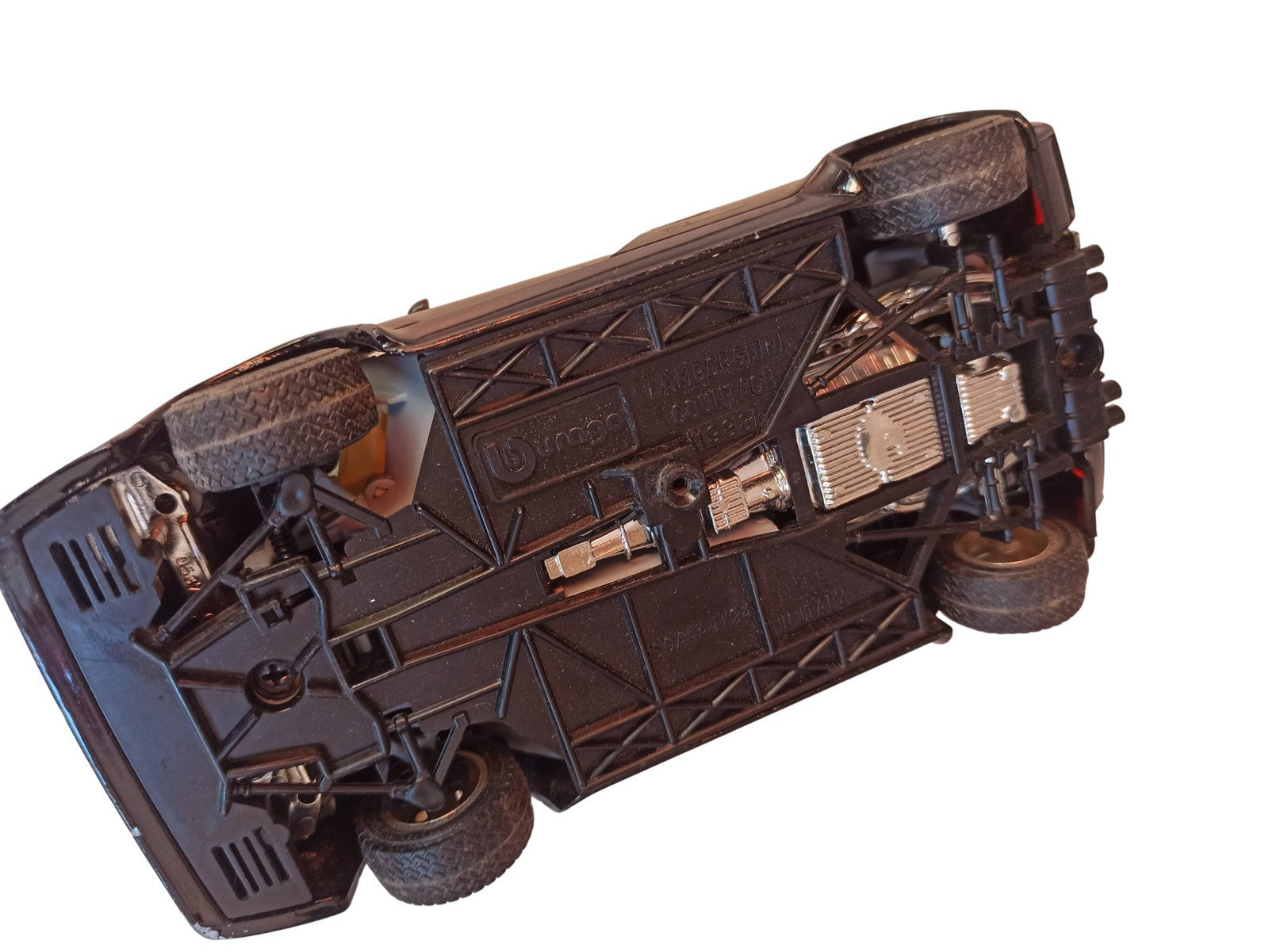 Voiture miniature Lamborghini Countach Burago vintage noire, ancien modèle colle