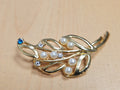 Broche vintage ancienne en métal doré, bijou rétro pour collection ou cadeau