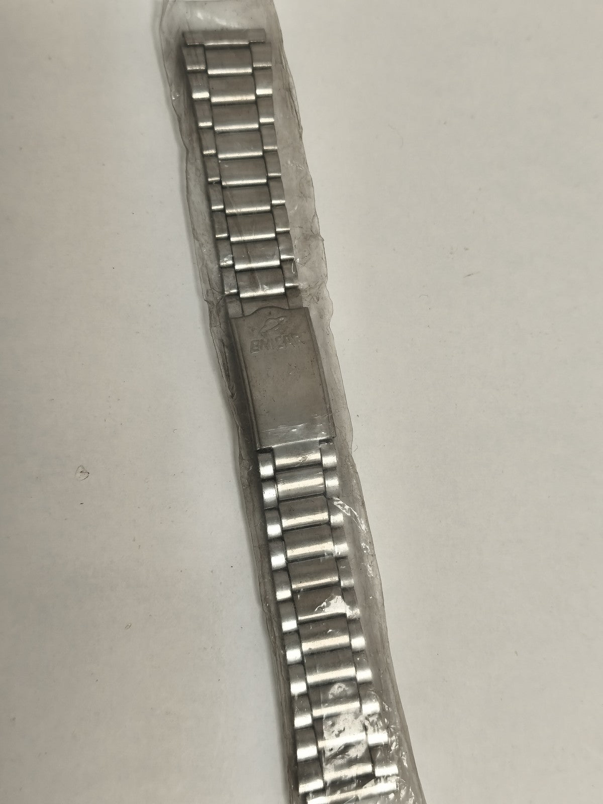 Bracelet montre Enicar vintage, finition métallique, maillons extensibles, ancie