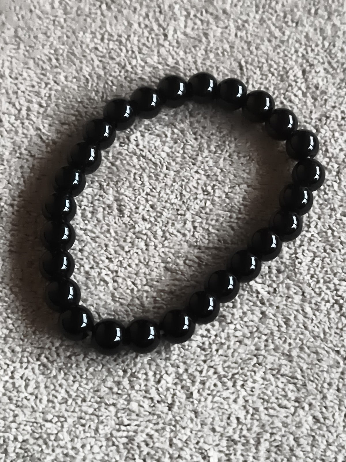 Bracelet perles noires pierres naturelles élastique élégant sobre