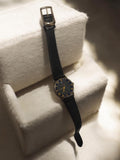 Montre homme vintage cadran noir chiffres romains dorés rétro à restaurer