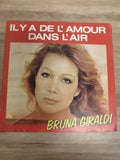 Vinyle 45 tours Bruna Giraldi - Il y a de l?amour dans l?air pochette rouge (Ref