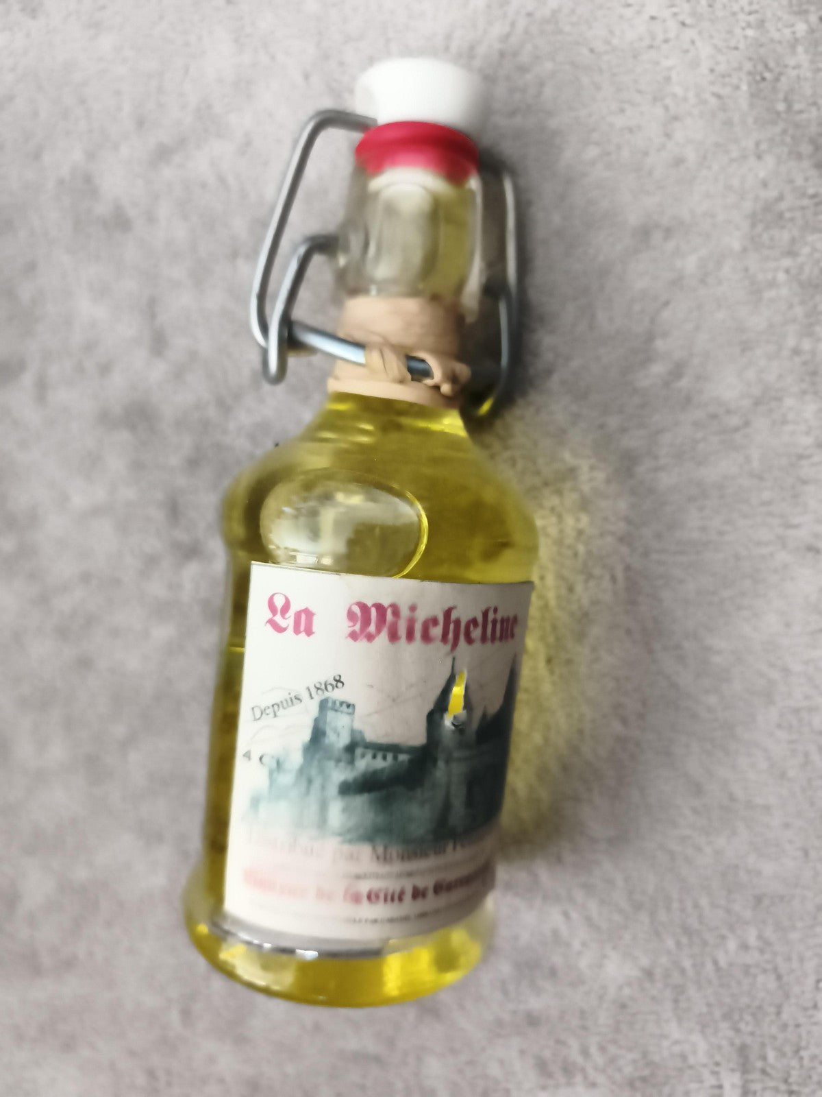 Miniature alcool La Micheline bouteille verre étiquette château bouchon mécaniqu