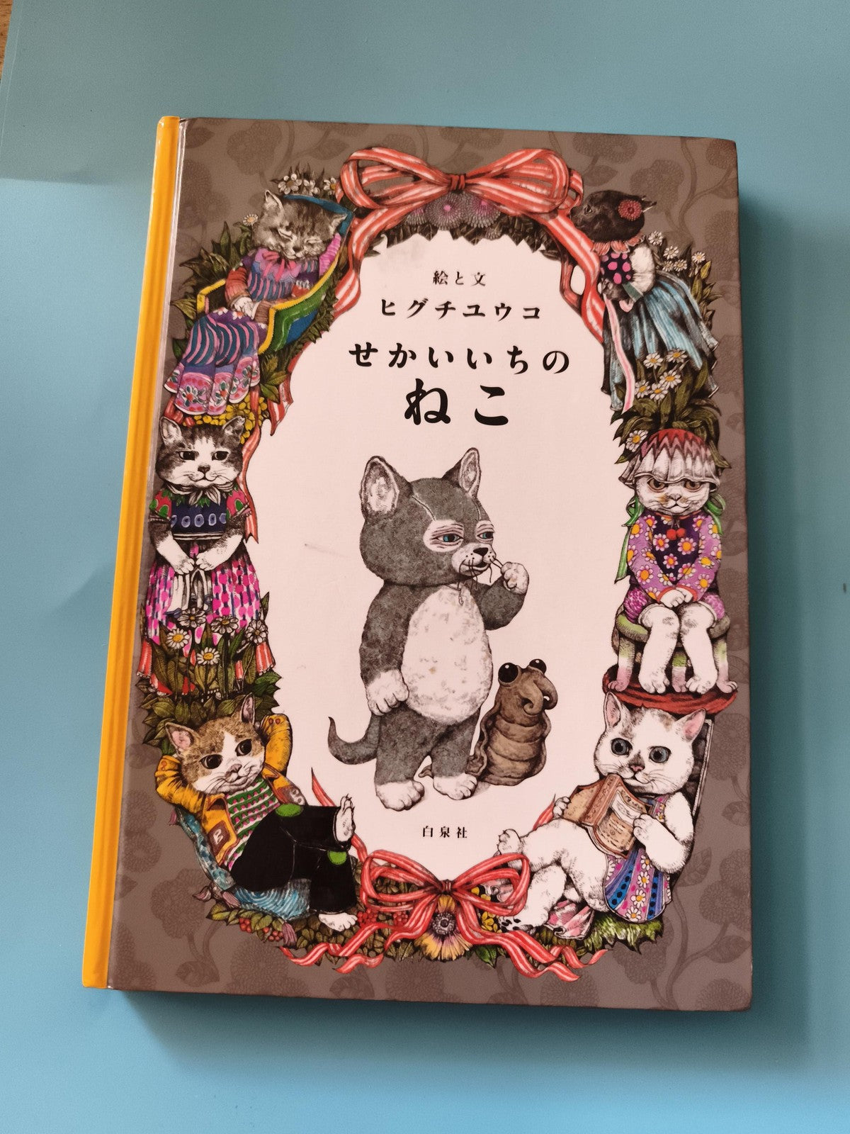 Livre illustré japonais chats Higuchi Yuko couverture rigide animaux