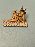 Vintage pin's Orangina publicitaire, femme maillot jaune à pois, collection