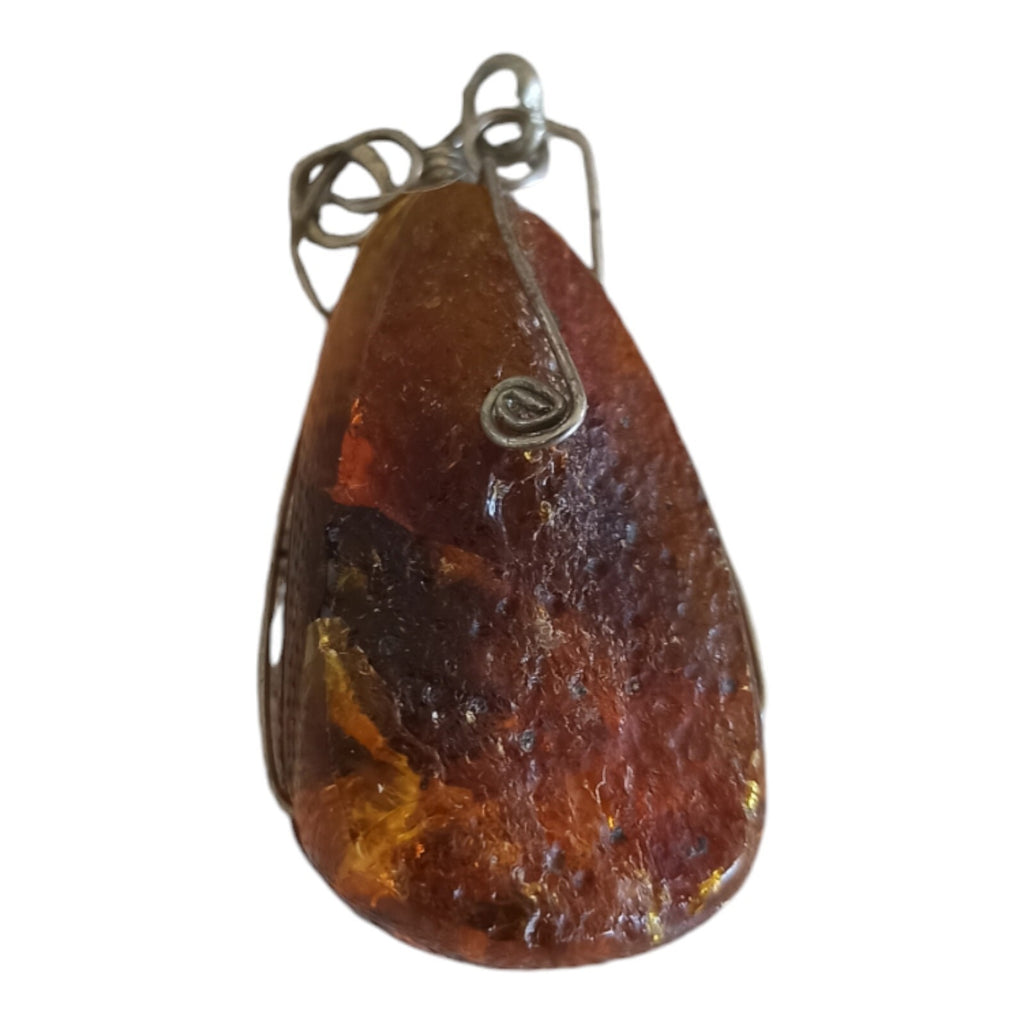 Pendentif ambre authentique monture fil métal style artisanal marron jaune