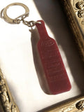 Porte-clés vintage bouteille PRADIGNAC Bordeaux rouge publicitaire France