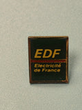 Pin's vintage EDF Electricité de France émaillé logo jaune noir collection