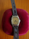 Montre mécanique vintage femme Kelton cadran patiné bracelet perforé rétro