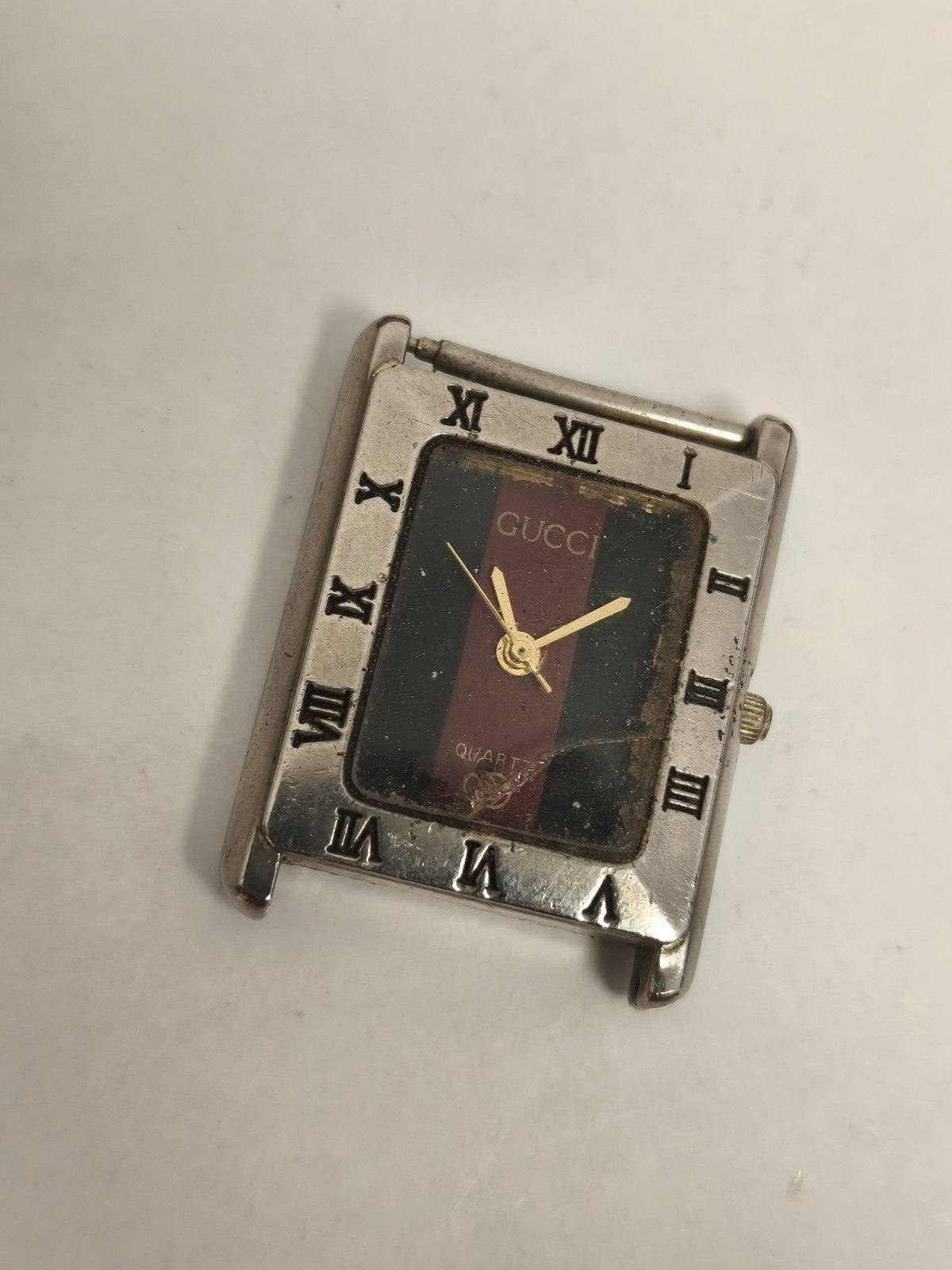 Montre Gucci vintage à restaurer quartz cadran rectangulaire bicolore