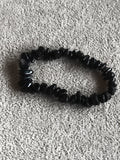 Bracelet pierres naturelles noir, perles irrégulières, élastique souple