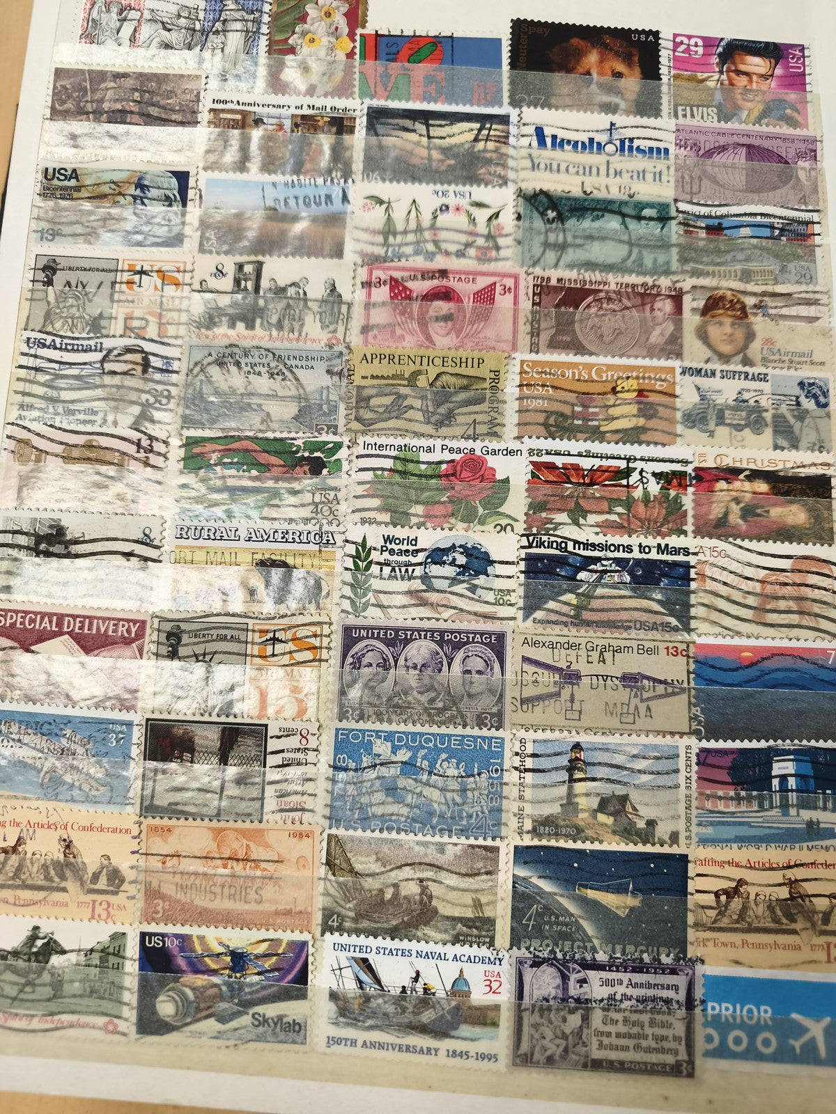 Lot de timbres USA oblitérés thématiques multicolores (support non inclus)