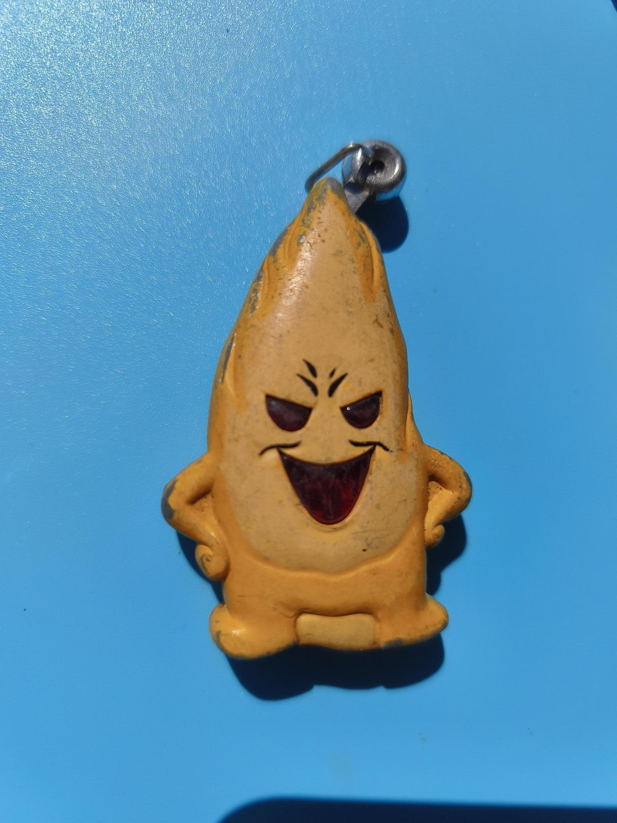 Ancien briquet publicitaire mascotte jaune, fantaisie, à restaurer, rare