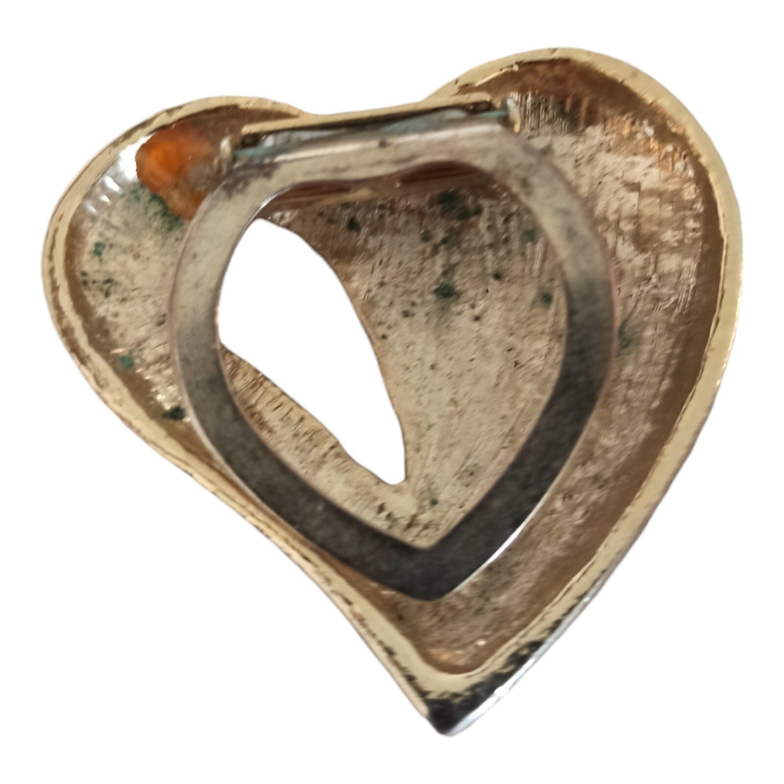 Vintage gold metal heart sculpture with small heart relief decoration, retro decorative item