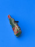 Pin's vintage GET 27 bouteille émaillée vert rouge collection publicité
