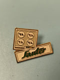 Pin's vintage Sauter forme plaque de cuisson, logo vert, collection publicitaire