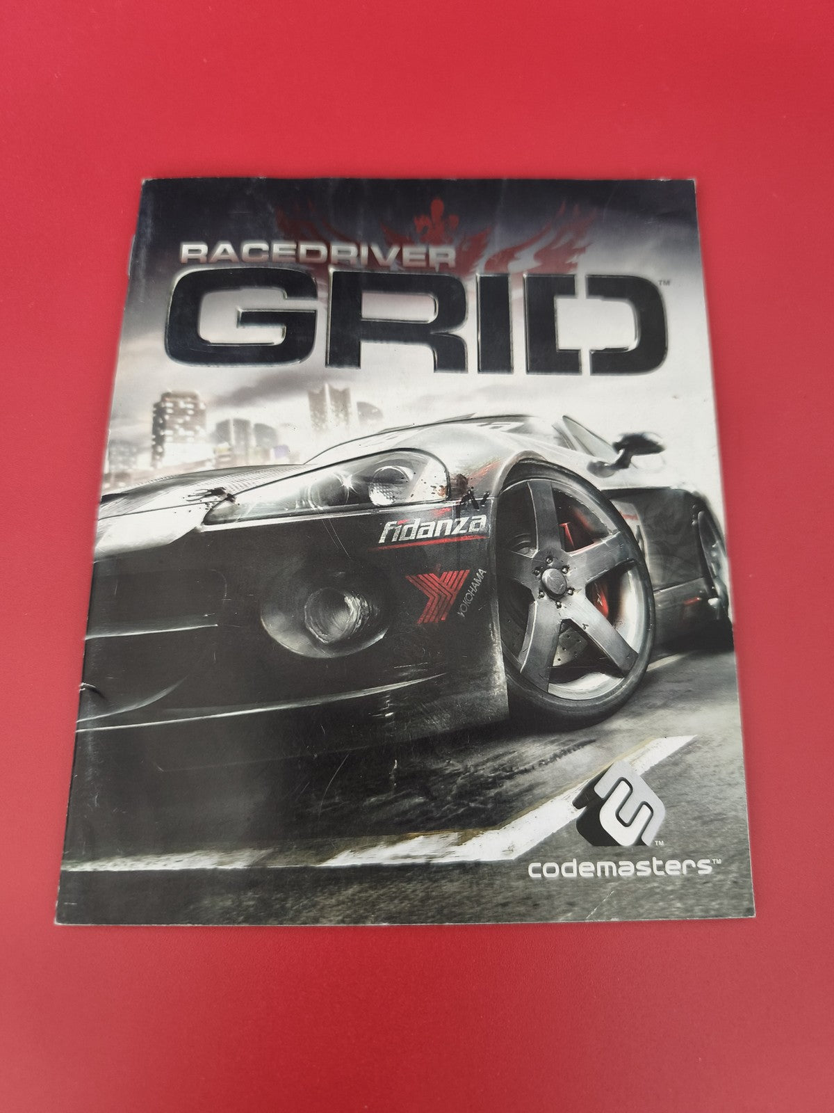 Notice originale pour jeu PS3 Grid, manuel Playstation 3 d'occasion, version FR