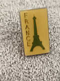 Pin's vintage France Tour Eiffel jaune émaillé, badge rétro souvenir (Ref 5)