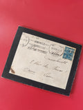 Enveloppe philatélie timbre bleu oblitérée, écriture manuscrite, cadre noir