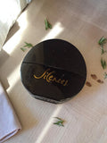 Flacon parfum vintage Silences noir, vaporisateur ancien, design rond rétro