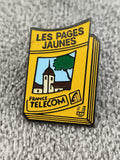 Pin's vintage Les Pages Jaunes France Télécom jaune logo annuaire publicitaire