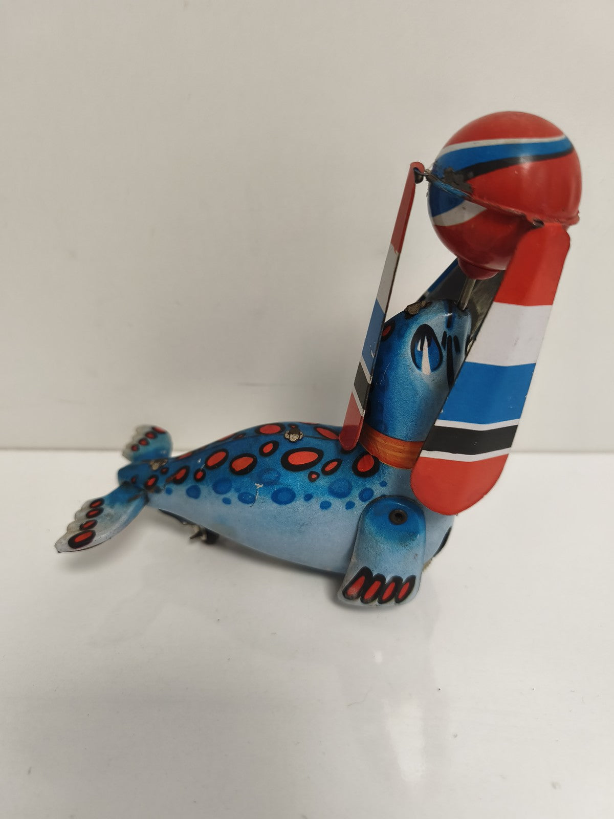 Jouet mécanique phoque cirque tôle peinte, tin toy seal, couleurs vives