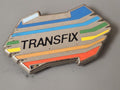 Pin's rétro ancien Transfix, badge vintage collection, objet publicitaire rare