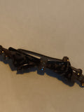 Broche vintage forme nœud noir et strass, barrette ancienne déco rétro
