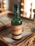 Bouteille ancienne Rhum Chauvet vintage, verre vert, étiquette d’origine