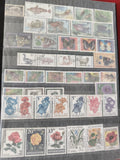 Lot de timbres bulgares usagés, motifs animaux et fleurs, multicolores