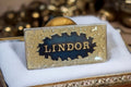 Pin's vintage Lindor émaillé doré, édition limitée, badge rétro