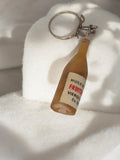 Porte-clés vintage bouteille huile FRUITDOR publicitaire ancien rétro rare