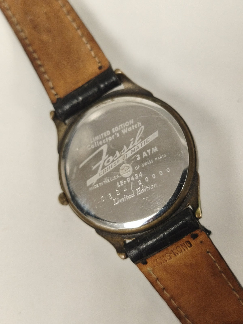 Rare montre Fossil édition limitée, cadran décor ville, manque verre
