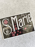Carte postale Ste Marie illustrée portrait femme fleurs CPA
