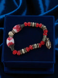 Bracelet perles rouges vintage rétro, fantaisie, gros maillons, motif marbré