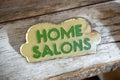 Pin's vintage HOME SALONS – badge publicitaire ancien, lettrage vert