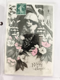 Carte postale ancienne Bonne Année femme hiver fleurs CPA vintage début XXe