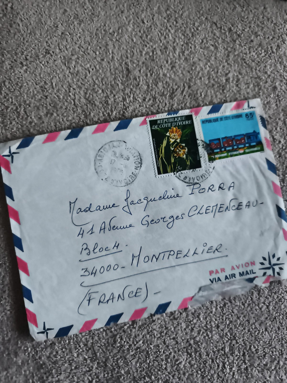 Lettre avion Côte d’Ivoire affranchie timbres fleurs train Philatélie (Ref 27)