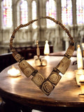 Collier en os sculpté motifs cerclés, bijou ethnique unique, fermoir métal