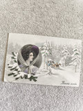 CPA Bonne Année femme portrait hiver traîneau neige illustrée
