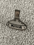 Pin's vintage METEOR toupie gris beige badge ancien (Ref 9)